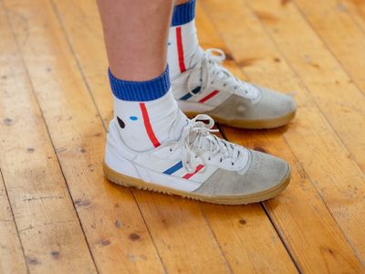 A person in comfortable sportswear mid-movement.